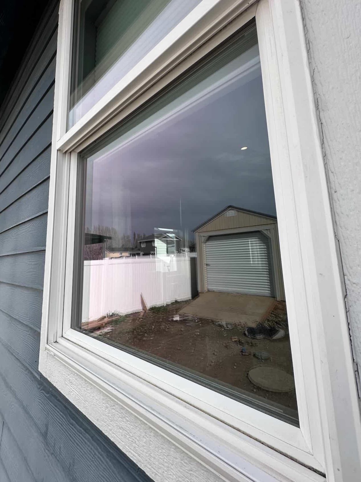 Crystal-clear residential window after professional cleaning in East Wenatchee