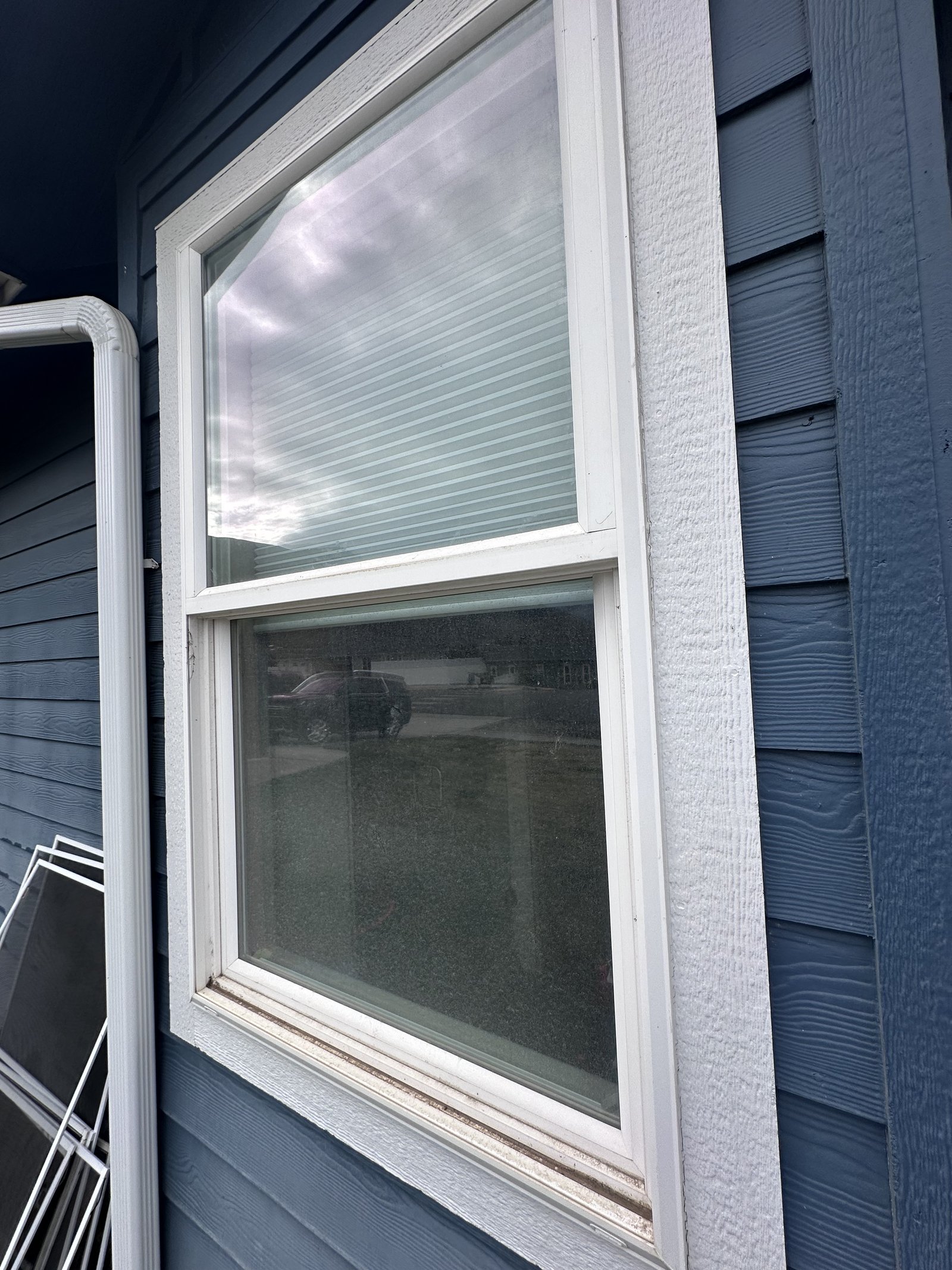 Before — hard water buildup on home windows in Wenatchee Valley